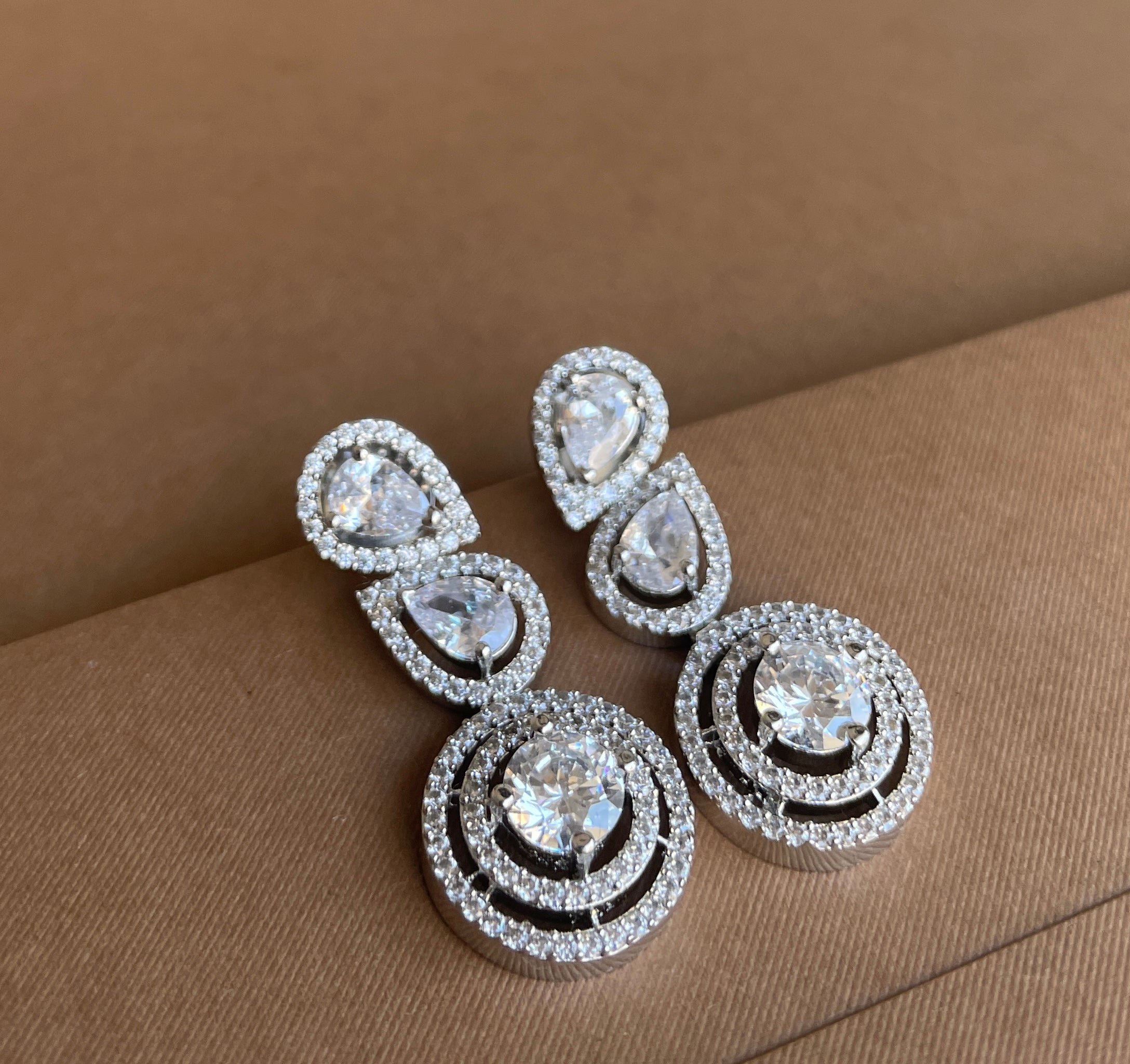 White Diamonds Finish Leaf Drop Earrings