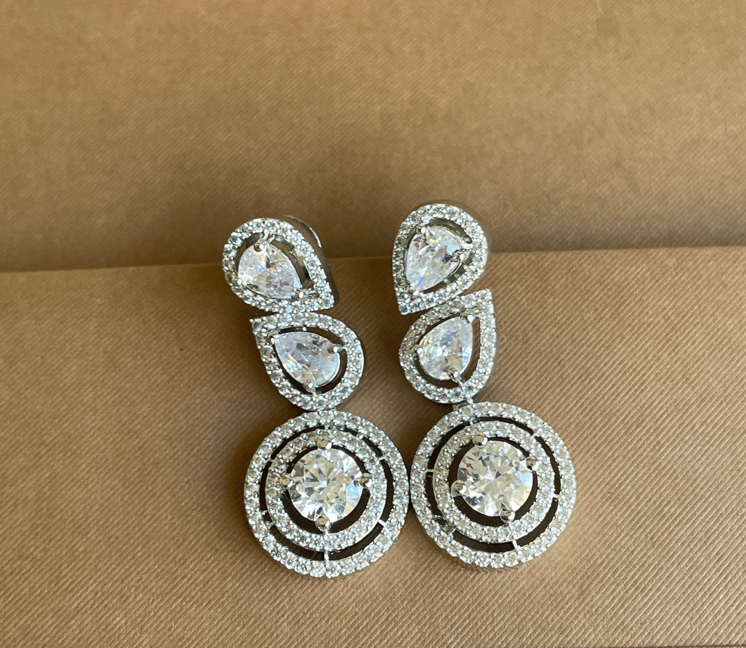 White Diamonds Finish Leaf Drop Earrings