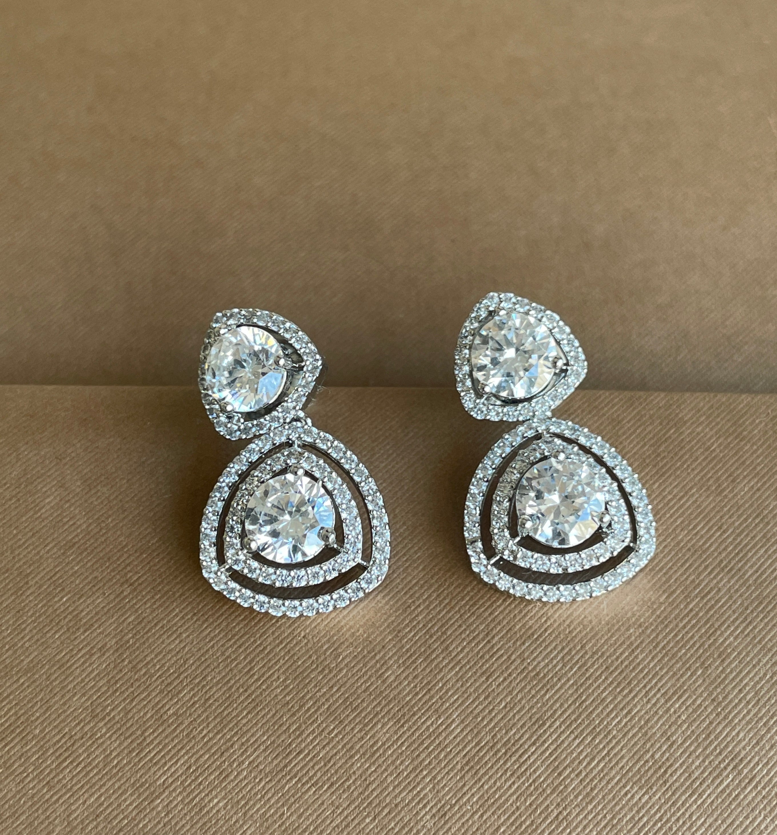 White Diamonds Finish Stud Earrings