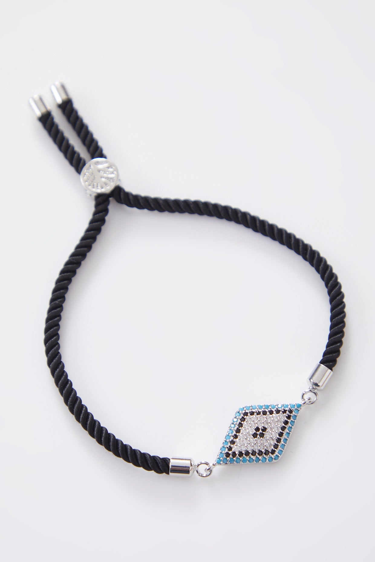 Diamond Crusted Silver Evil Eye Rakhi With Adjustable String