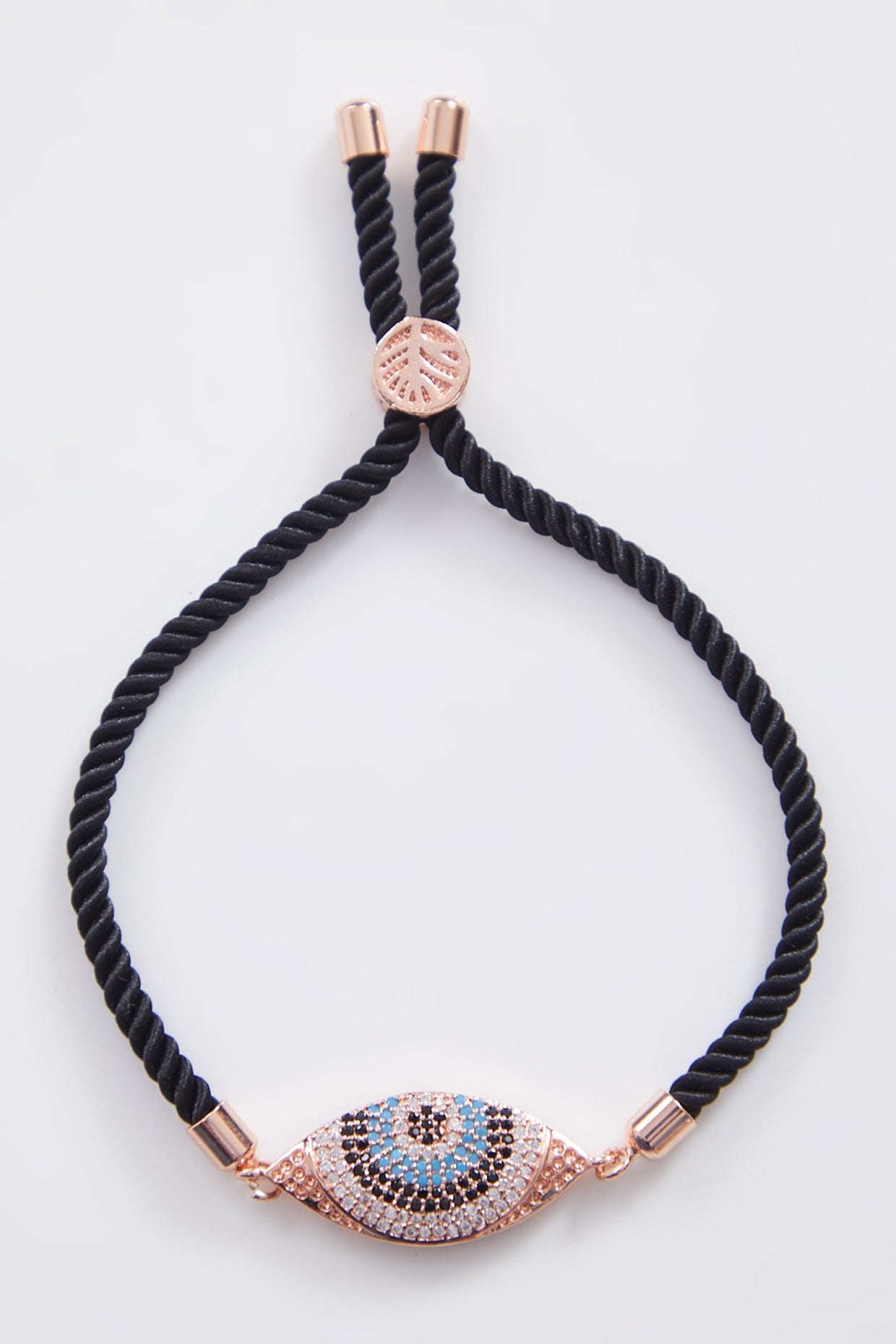 Crusted Rose Gold Evil Eye Rakhi With Adjustable String