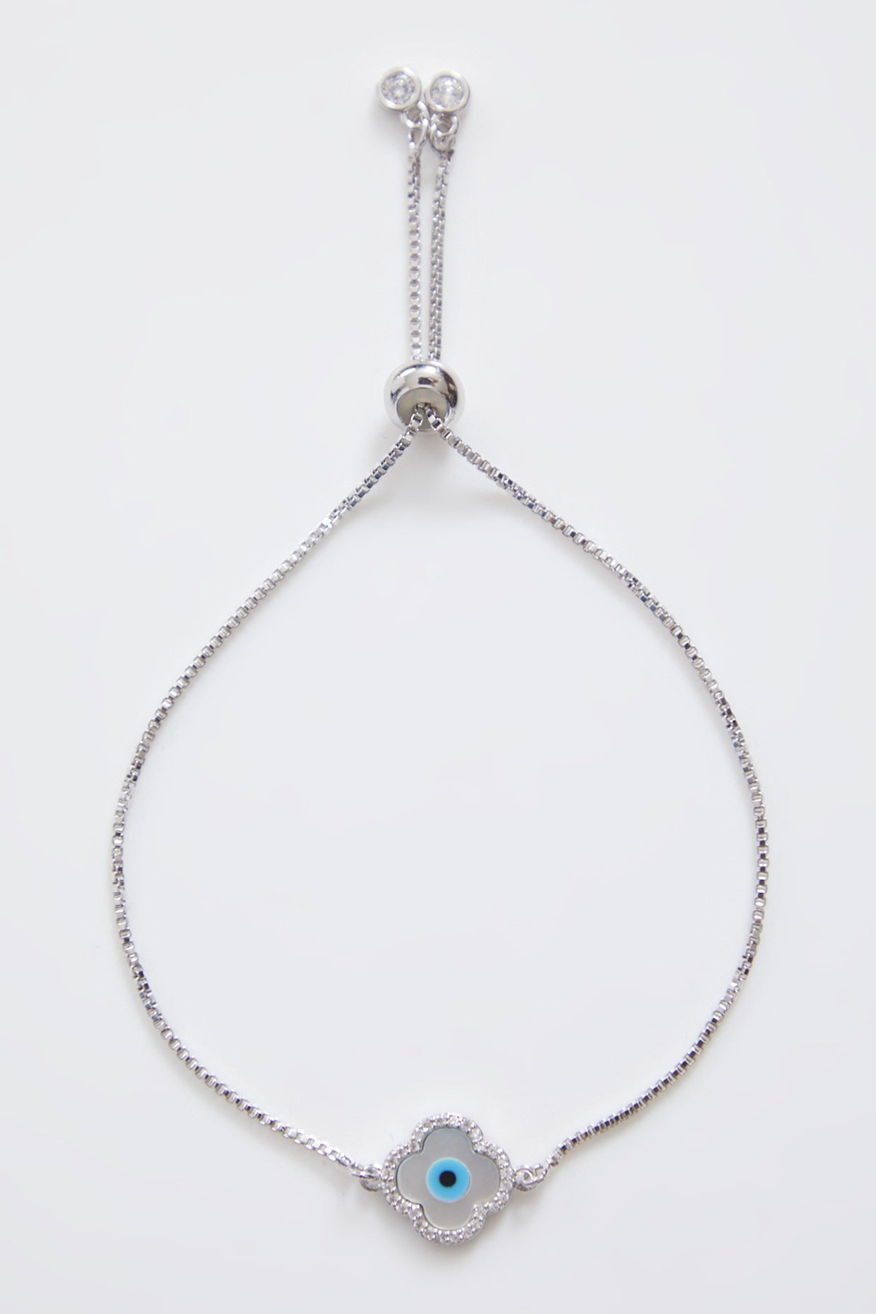 Delicate Mother of Pearl Silver Evil Eye Rakhi With Silver Adjustable String