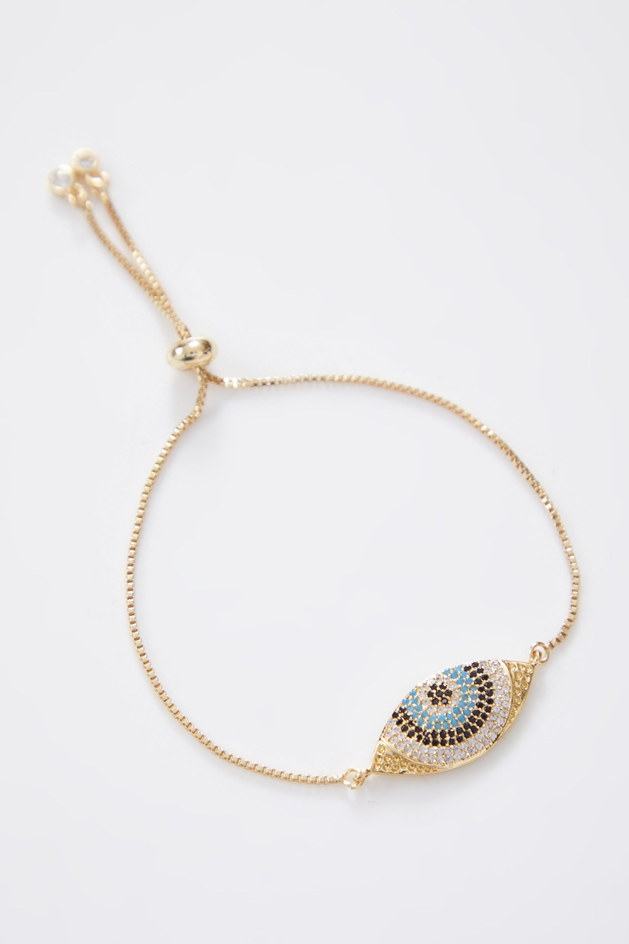 Crusted Gold Evil Eye Rakhi With Gold Adjustable String