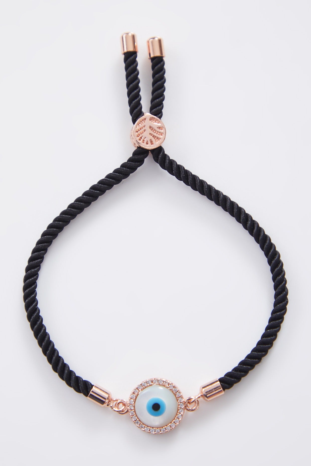 Round Rose Gold Pearl Evil Eye Rakhi With Adjustable String