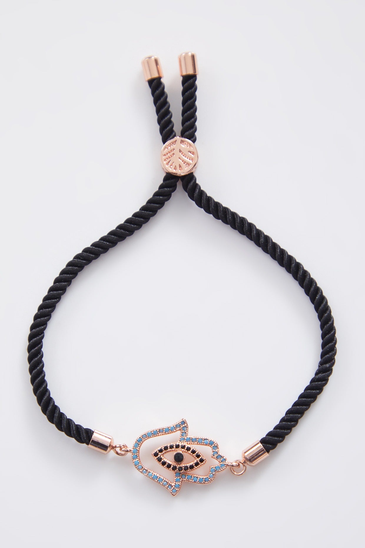 Double Encrusted Rose Gold Hamza Evil Eye Rakhi With Adjustable String