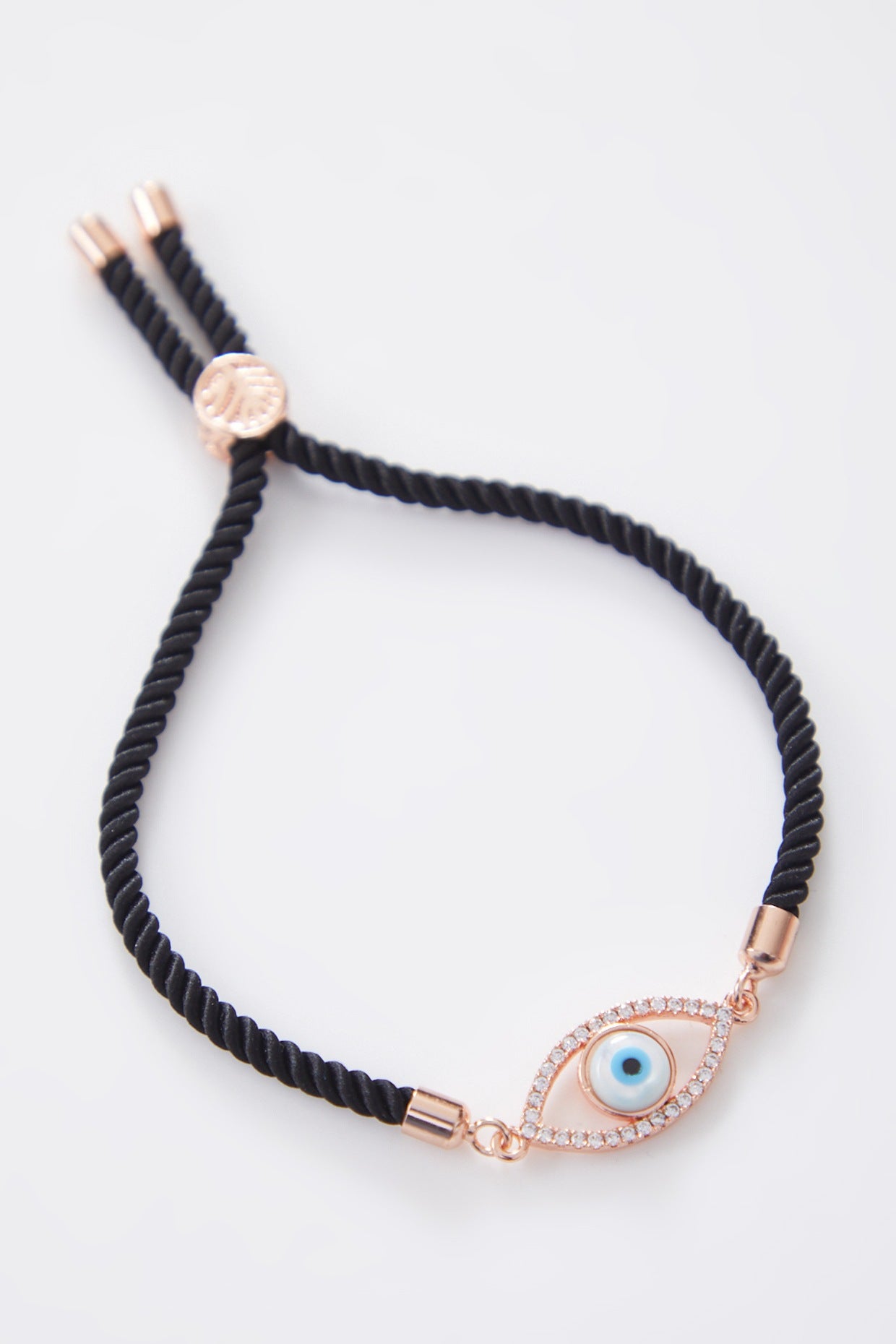 Classic Rose Gold Pearl Evil Eye Rakhi With Adjustable String