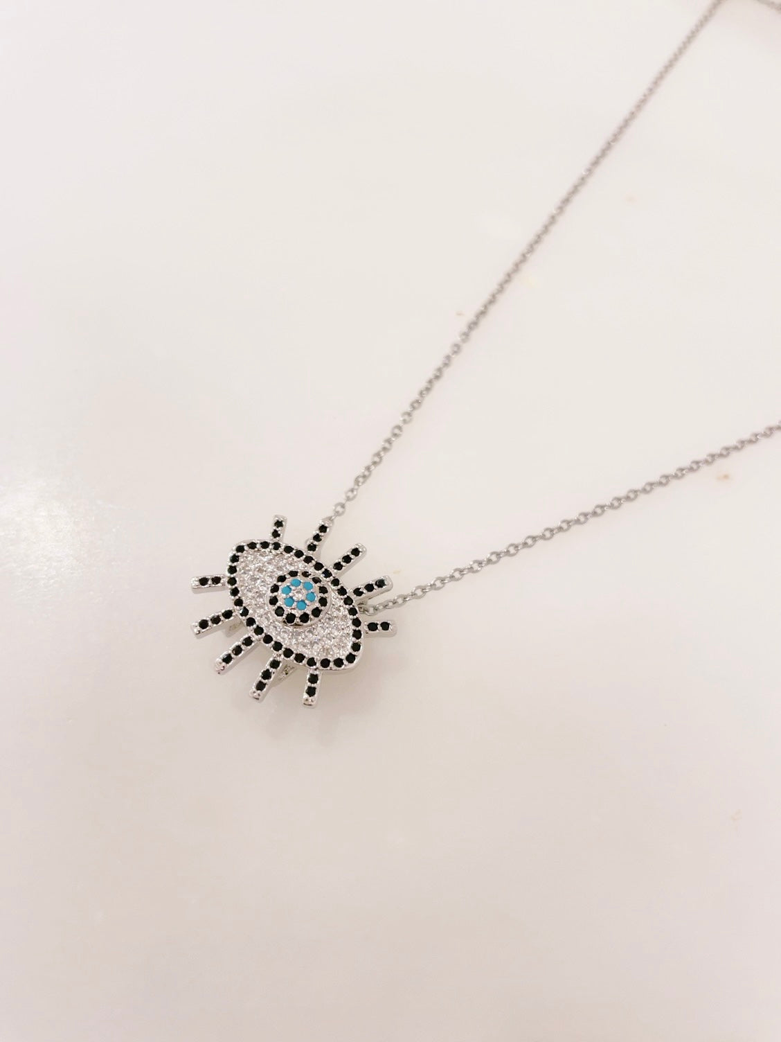 Ikasiya Silver Turq Crystal Studded Evil Eye Necklace