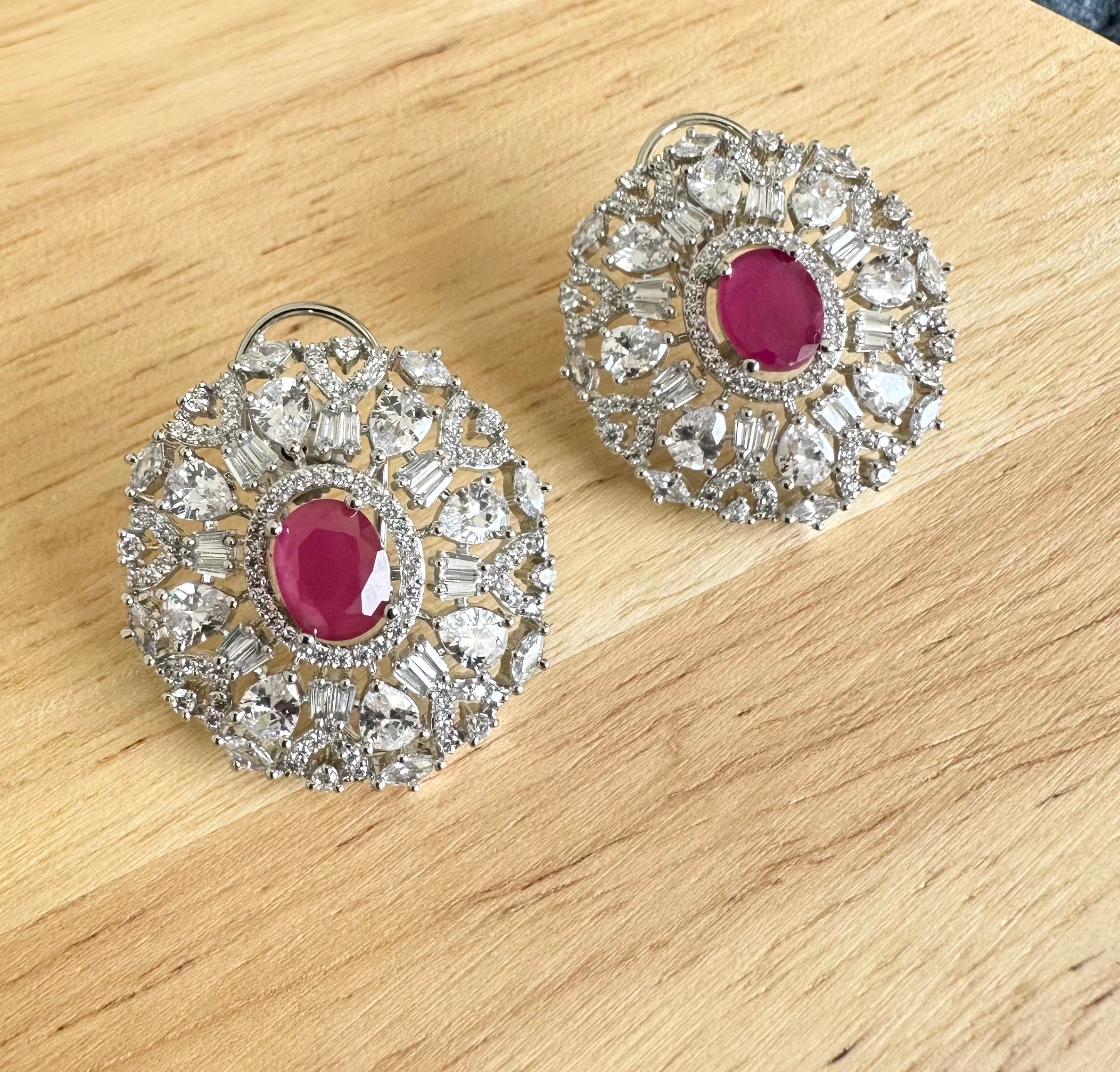 White Diamonds With Red Stone Stud Earrings