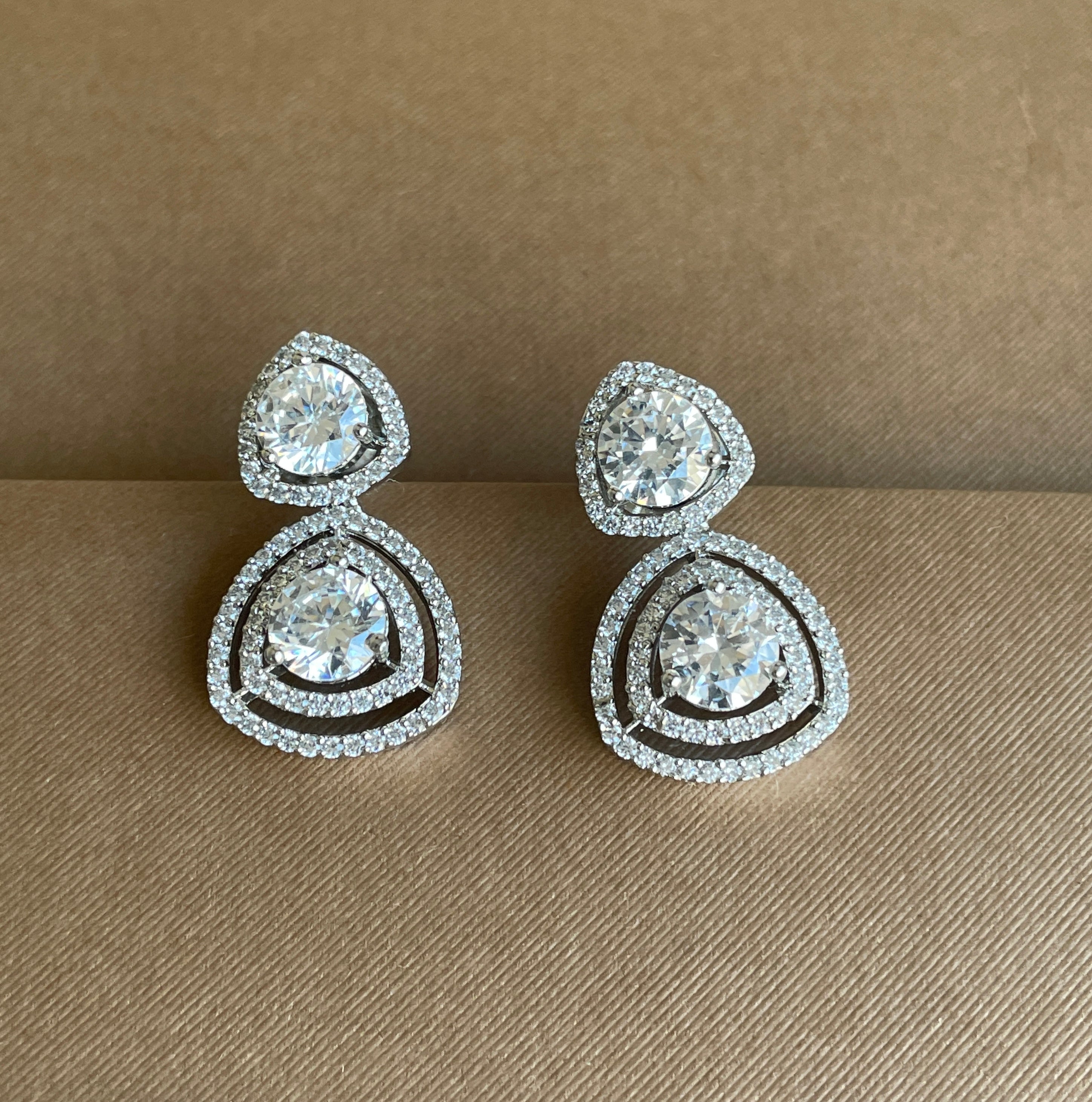 White Diamonds Finish Stud Earrings