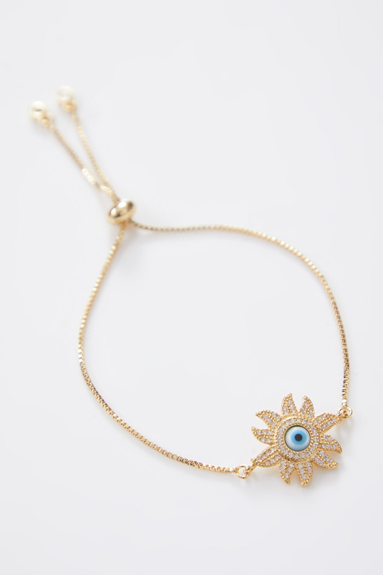Gold Flower Pearl Evil Eye Rakhi With Adjustable Gold String