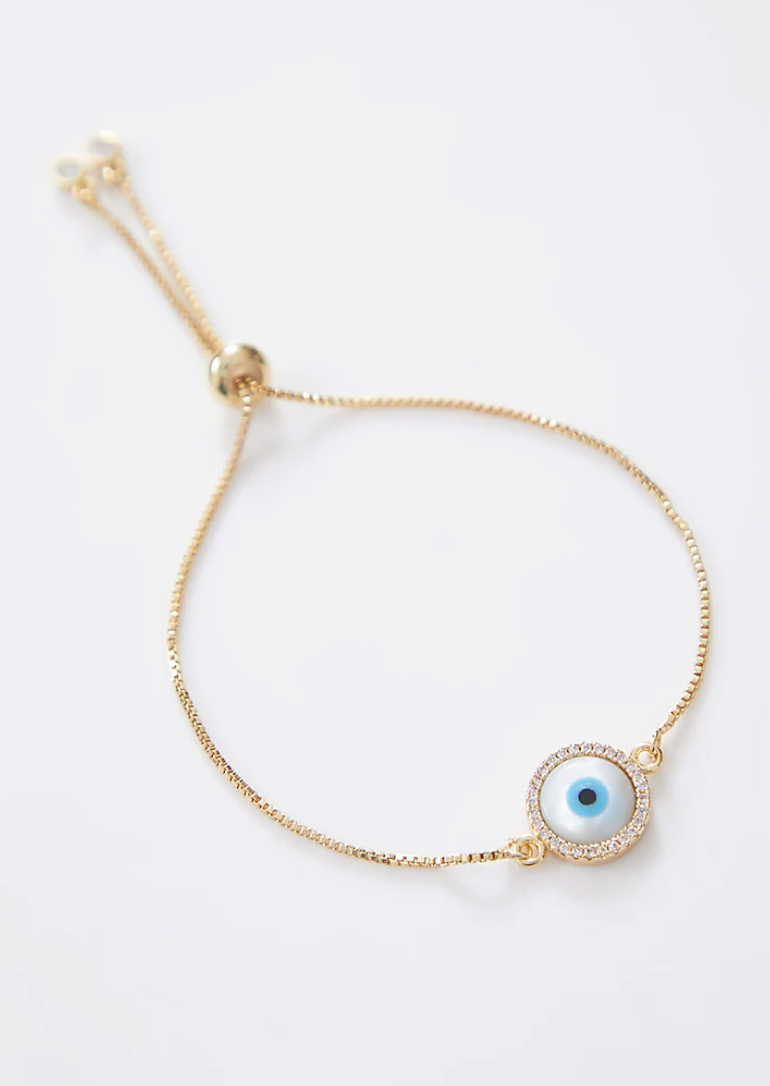 Round Gold Pearl Evil Eye Rakhi With Gold Adjustable String